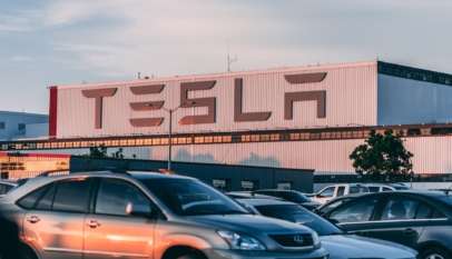 cars parked in front of company building